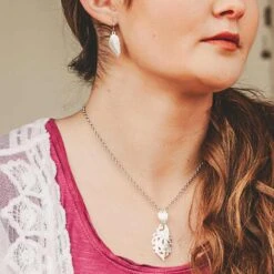 Montana Silversmiths Mountain Calling Feather Earrings -Western Cowboy Equipment Store img81126 montana silversmiths mountain calling feather earrings